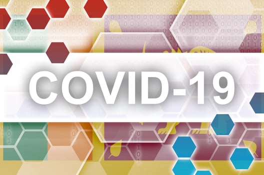 Sri Lanka flag and futuristic digital abstract composition with Covid-19 inscription. Coronavirus outbreak concept photo