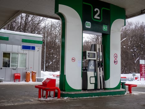Gas station in the winter city. Petrol. Machine maintenance photo