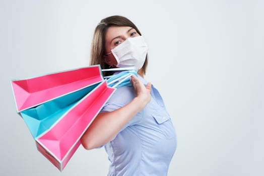 Attractive woman wearing protective mask isolated over white background photo
