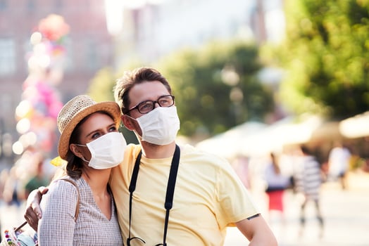 Adult tourists in masks sightseeing Gdansk Poland photo