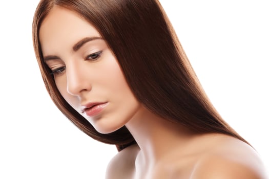 Brunette with straight hair on white background photo