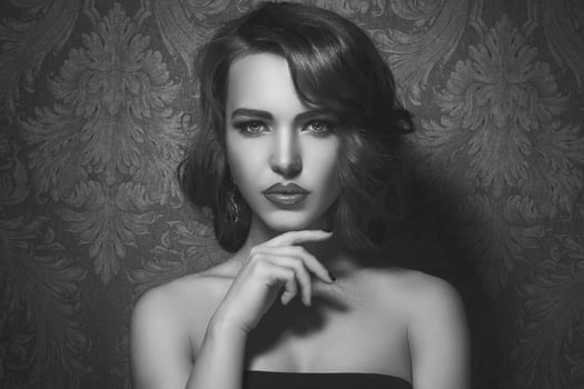 Portrait of beautiful young woman in studio photo