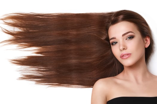 Woman with beautiful long hair on white background photo