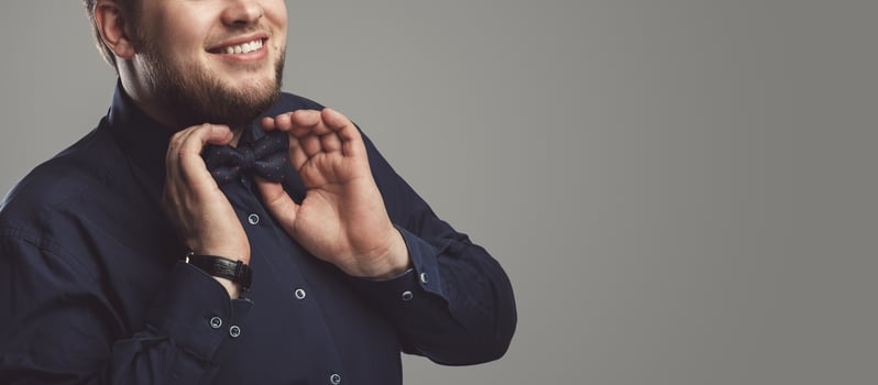 Handsome man with beard wearing bow tie photo