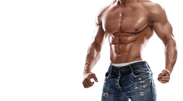 Muscular man wearing jeans photo