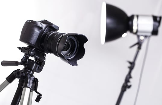 DSLR camera on tripod photo