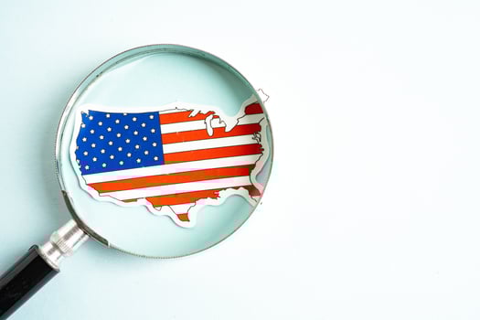 USA America flag and magnifying glass with copy space. photo