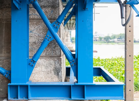 Steel frame scaffolding at the bridge renovation work on the river photo
