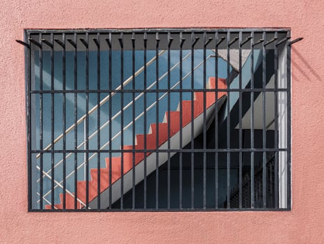 Framed view of fire escape stair in building photo