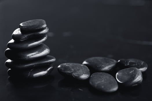Closeup of black hot rocks for stone massage photo