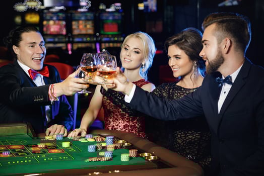 People celebrating their win after successful game in the casino photo