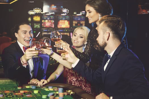 People celebrating their win after successful game in the casino photo