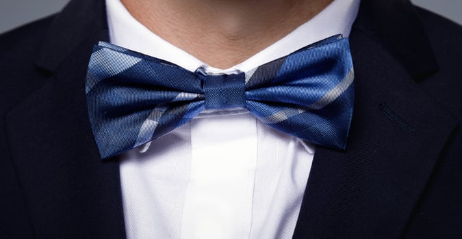 Male neck with beautiful blue bow tie photo