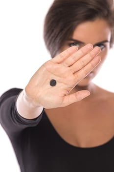 The Black Dot Campaign. Sign of domestic violence photo