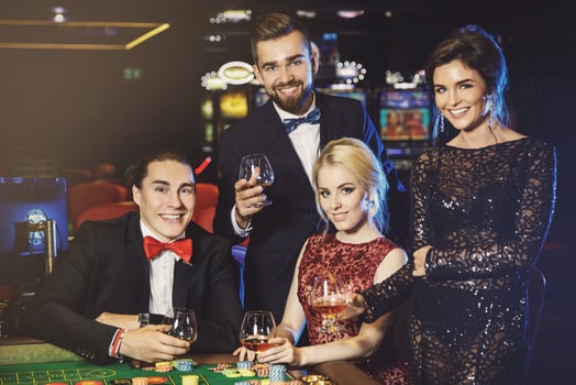People celebrating their win after successful game in the casino photo