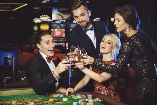 People celebrating their win after successful game in the casino photo