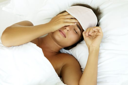 Woman is feeling bad after not enough sleeping photo