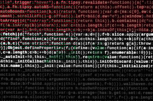 Iraq flag  is depicted on the screen with the program code. The concept of modern technology and site development photo