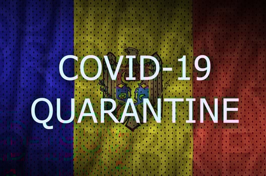 Moldova flag and Covid-19 quarantine inscription. Coronavirus or 2019-nCov virus photo