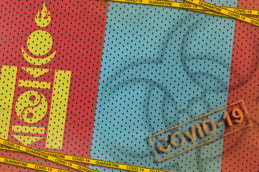 Mongolia flag and Covid-19 biohazard symbol with quarantine orange tape and stamp. Coronavirus or 2019-nCov virus concept photo
