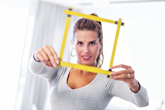 Mature woman doing home improvements photo