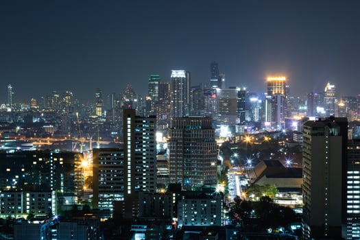 Scenic view of Modern Bangkok city at night photo