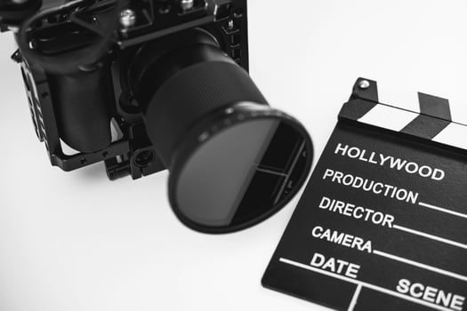 Modern mirrorless camera rig and clapperboard photo