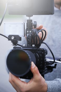 Videographer with a modern mirrorless camera rig photo