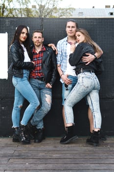 Two stylish couples on a city street photo