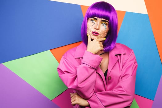 Model in creative image with pop art makeup photo