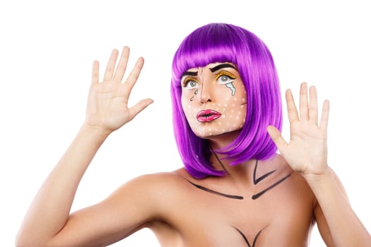 Model in creative image with pop art makeup photo