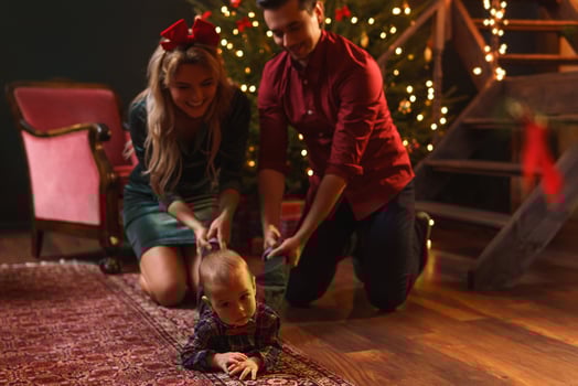 Young happy family are celebrating Christmas or New year. photo