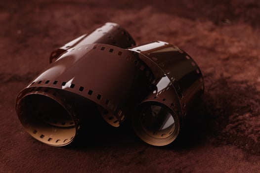 Photo film on the brown velvet background
