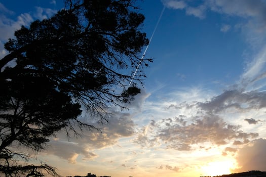 Clouds and light effects in the sky at dawn or dusk. photo