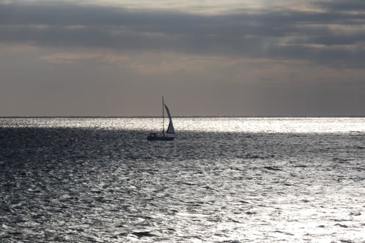 Sailboat sailing in the mediterranean sea, calm waters photo