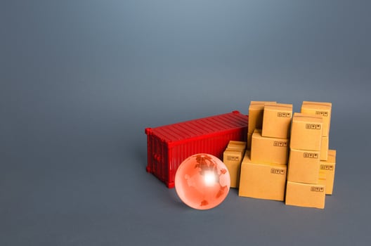 Earth globe and boxes with container. Trade and transportation of goods. Business globalization. Import export. Logistics industry. Online orders. Transport industry. Economic zone. World trading photo