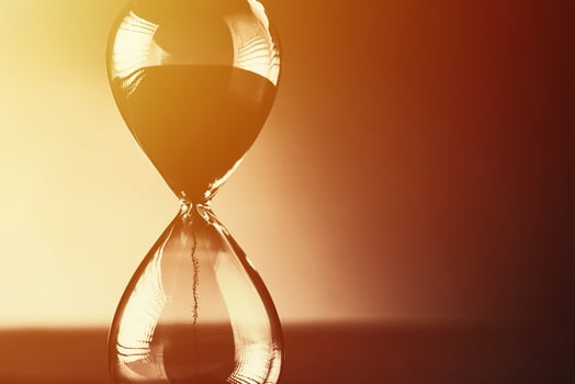Hourglass on the dark background with copy space photo