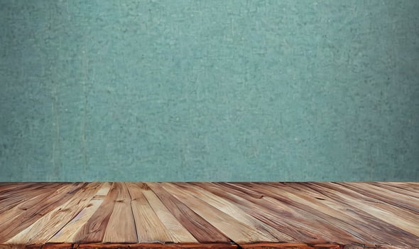Empty wooden table in front of its background. photo