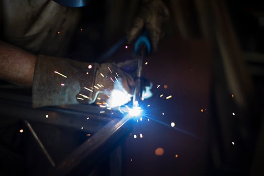 Steel welding. Metal seam welding. High temperature blue. photo