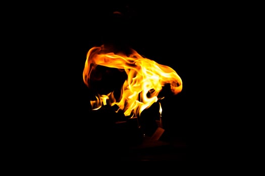 Fire flame texture. Burning material backdrop. Burn effect pattern. Blaze and torch wallpaper. Heat and haze backdrop. photo
