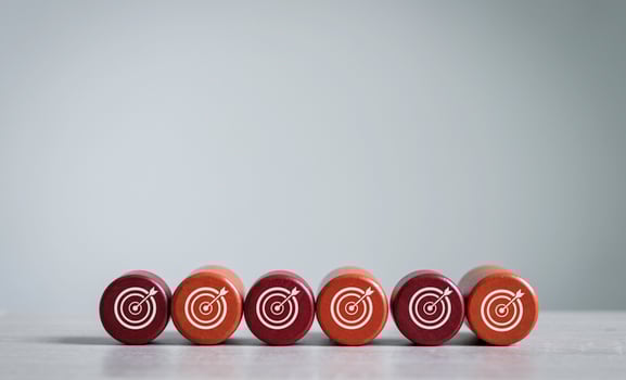 Dart board, conceptualization to lead to the right goal. cube block to contain the purpose of doing business overcoming challenges Walking towards goals and winning, photo