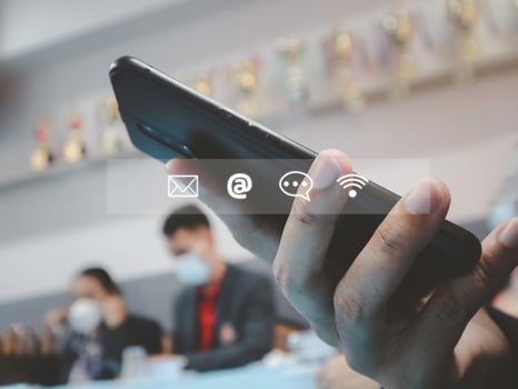 Businessman using Smart Phone with Chat message Customer support hotline .check email, call phone, address, Contact us people connection in the social world photo