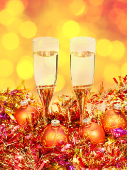 glasses, gold Xmass balls on blurry background 2 photo