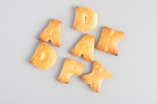 English letter bread snack on gray background photo