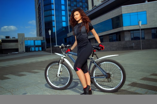 pretty sports girl on bike photo