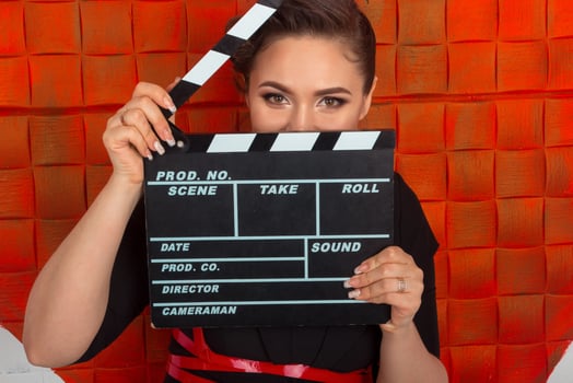 Woman with the clapper photo