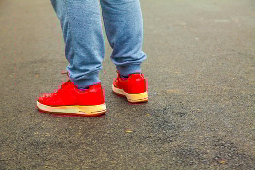 man in red sneakers photo