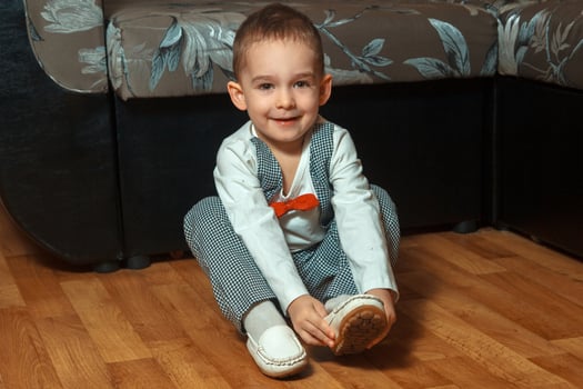 little boy smiling on camera photo