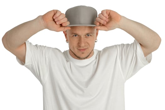 beautiful man in white t-shirt and cap photo