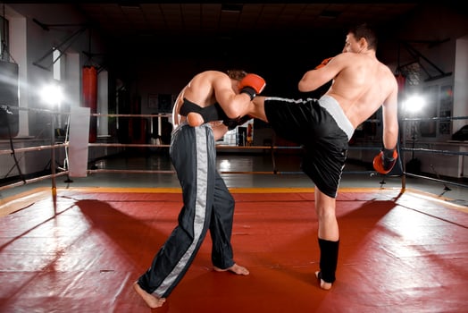 Two men is boxing on the ring photo